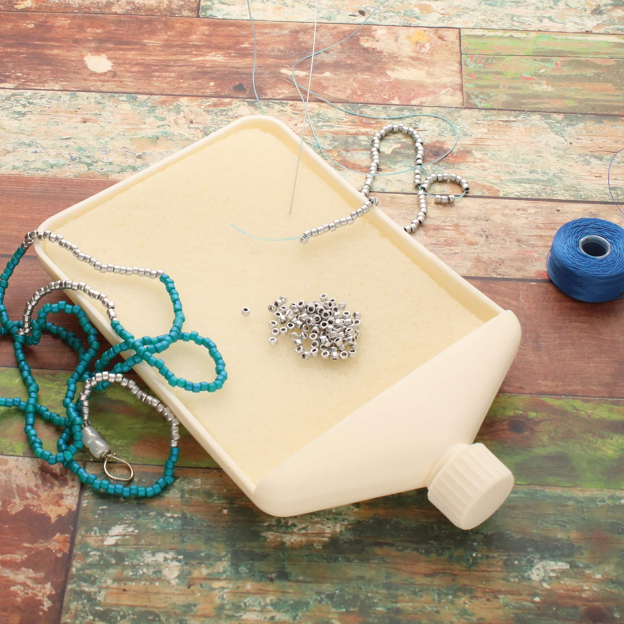 The Beadsmith® BASIC elements™ Small Funnel Tray with Mat